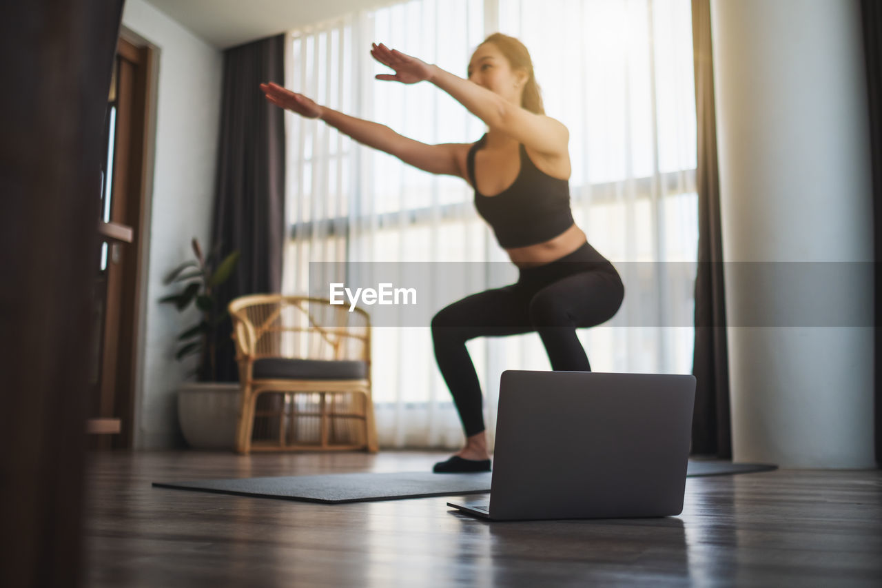 Woman exercising at gym