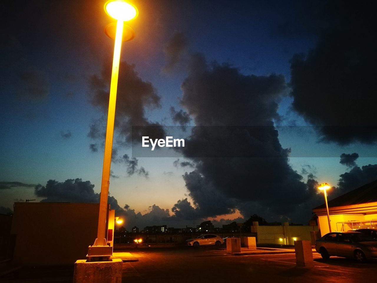 STREET LIGHT AGAINST SKY AT NIGHT