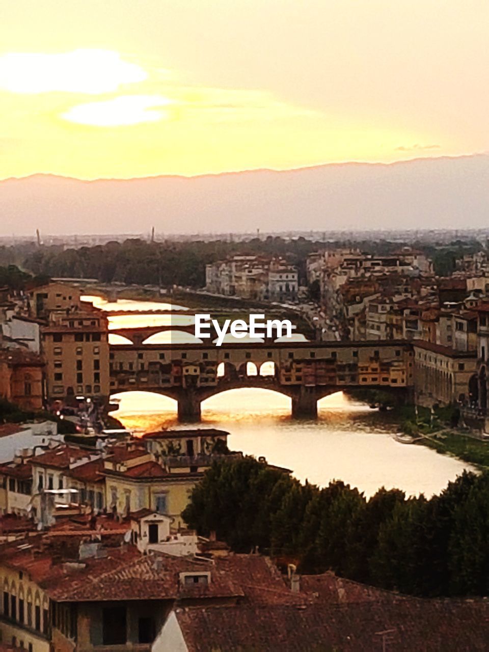 High angle view of bridge over river against buildings