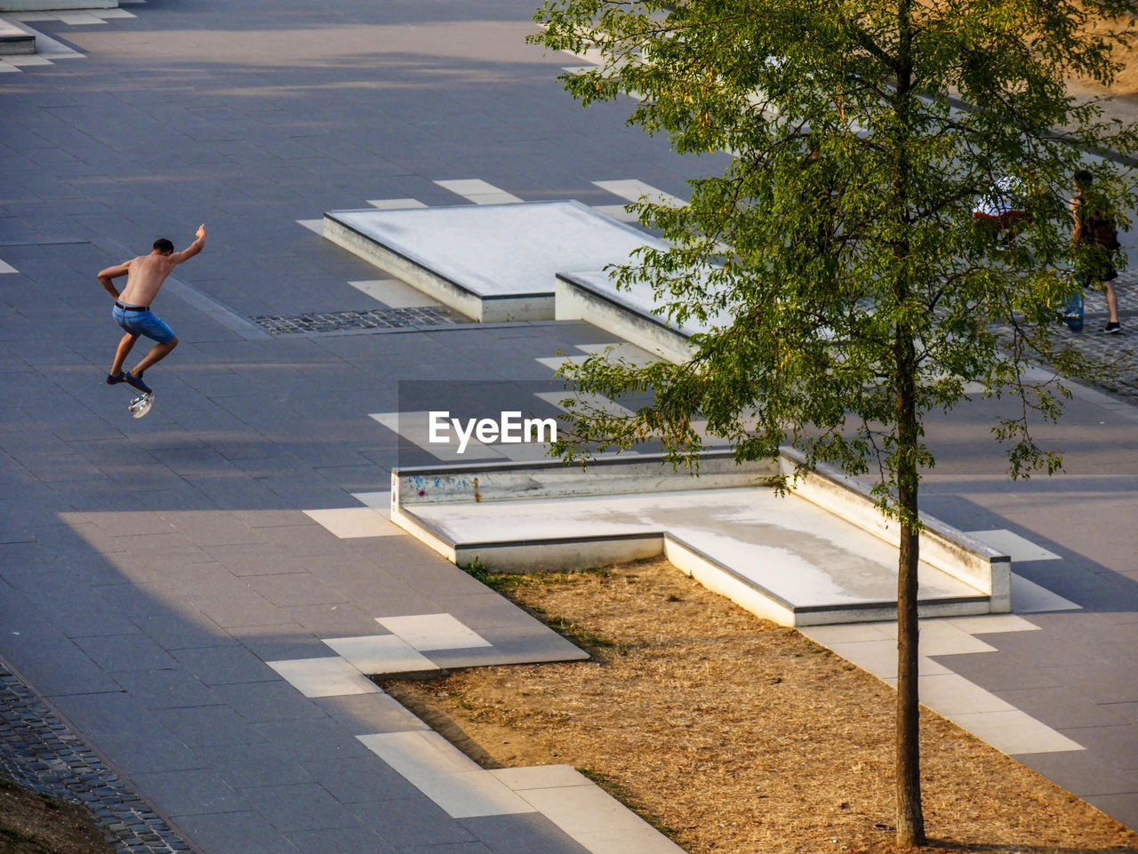 High angle view of man skateboarding on street