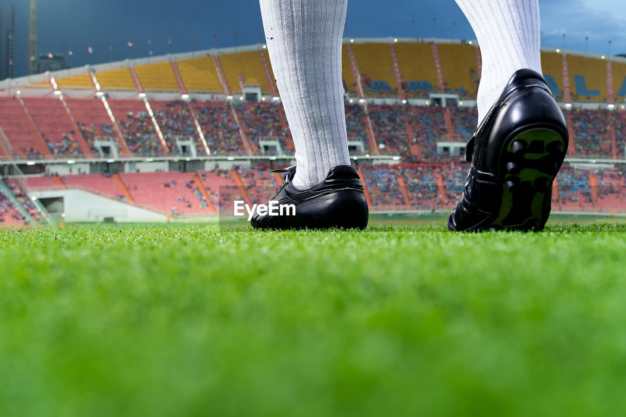 Low section of man on soccer field