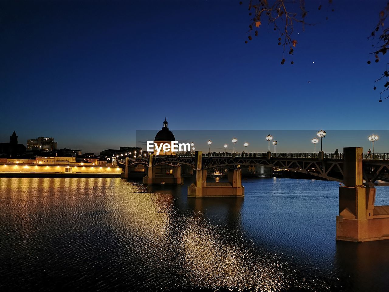 architecture, reflection, built structure, dusk, water, evening, sky, night, bridge, travel destinations, building exterior, illuminated, nature, city, sunset, river, travel, cityscape, no people, horizon, transportation, clear sky, tourism, building, blue, landmark, history, the past, outdoors, tower, skyline