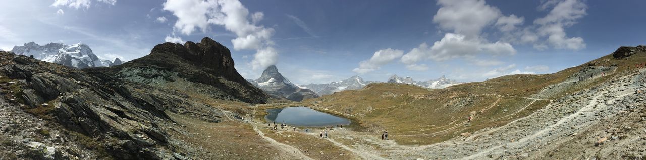 Panoramic view of landscape and mountains against sky