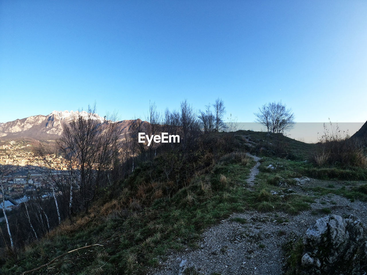 SCENIC VIEW OF LAND AGAINST CLEAR BLUE SKY