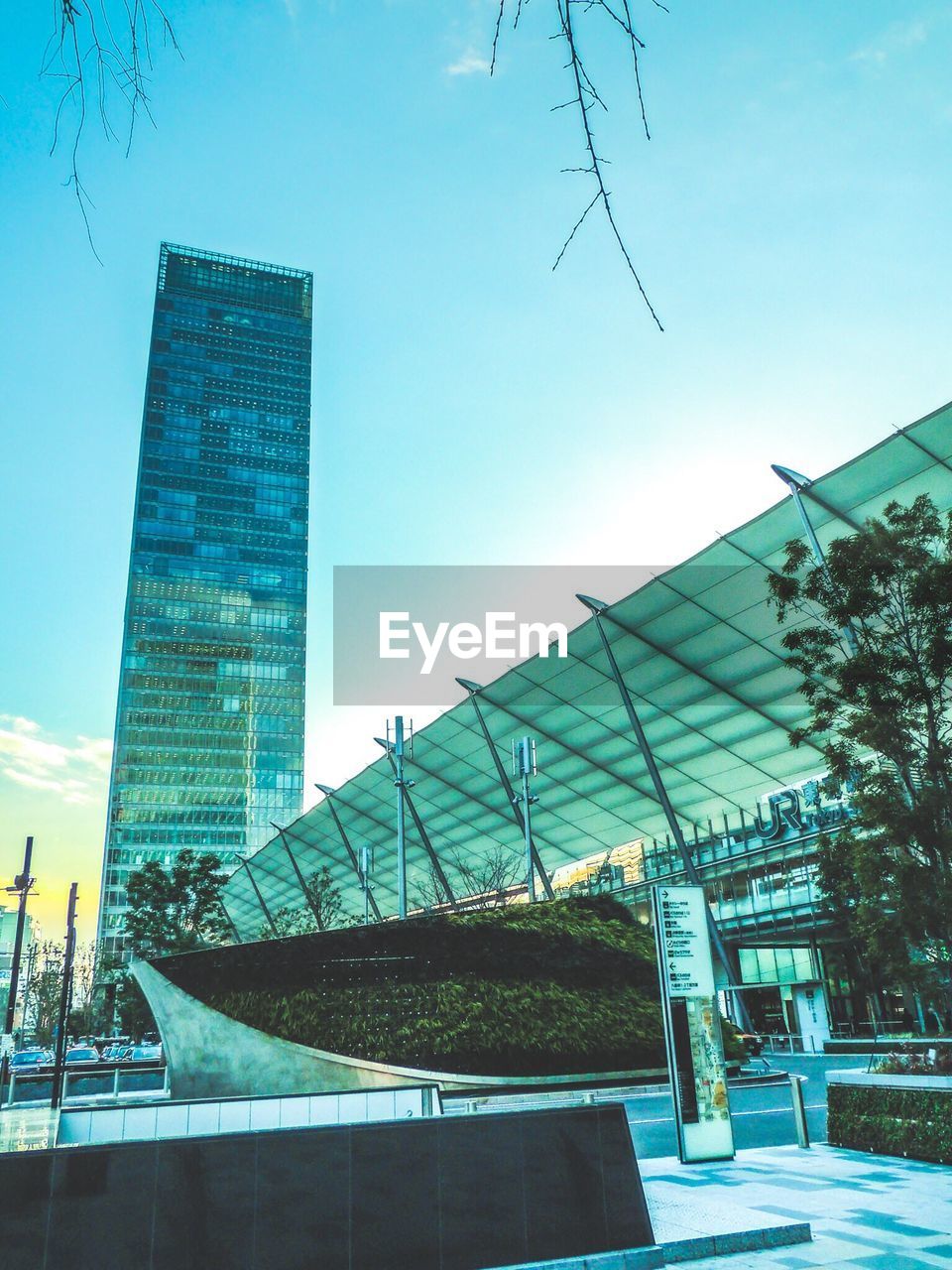 MODERN BUILDINGS AGAINST BLUE SKY