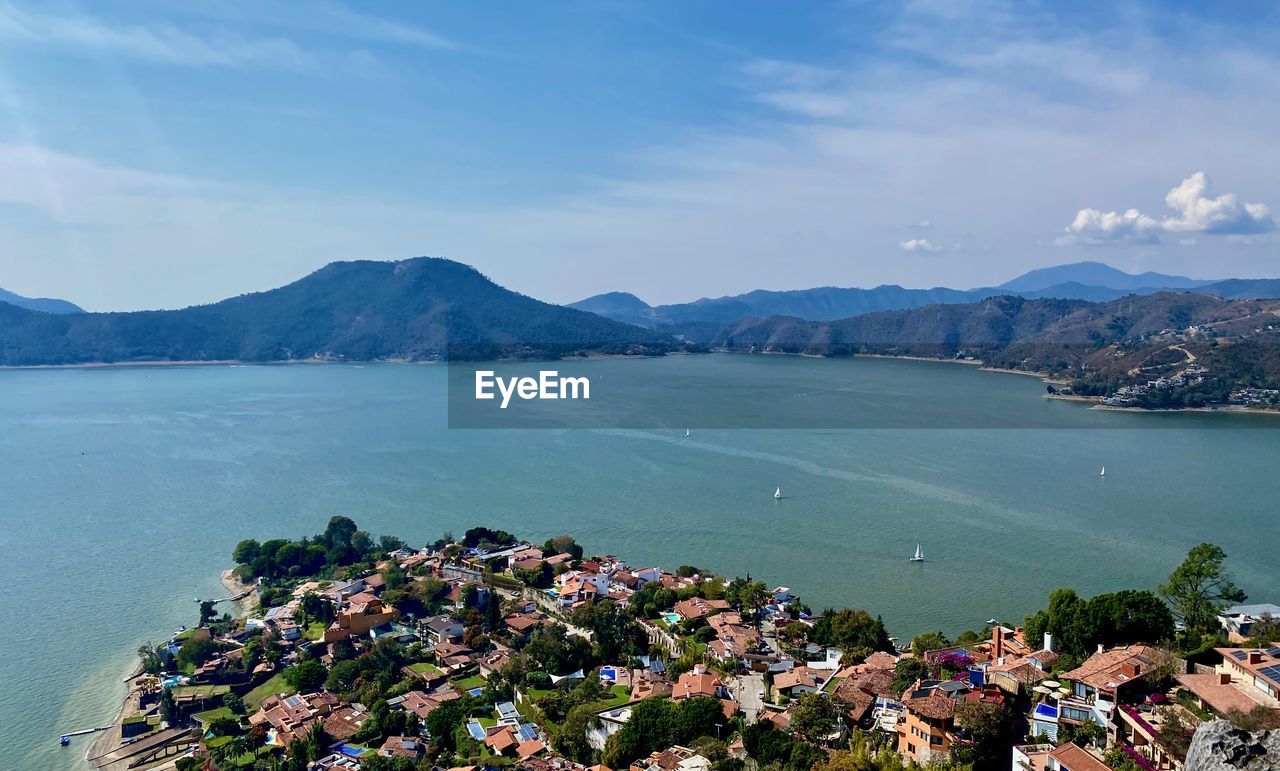 SCENIC VIEW OF SEA BY TOWN