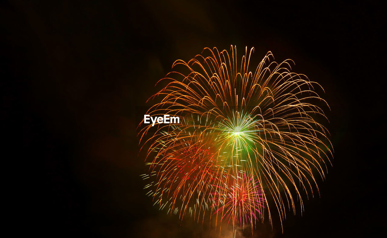 fireworks, night, celebration, firework display, motion, event, illuminated, arts culture and entertainment, exploding, no people, glowing, sky, nature, multi colored, long exposure, firework - man made object, recreation, new year's eve, outdoors, blurred motion, festival, dark, low angle view