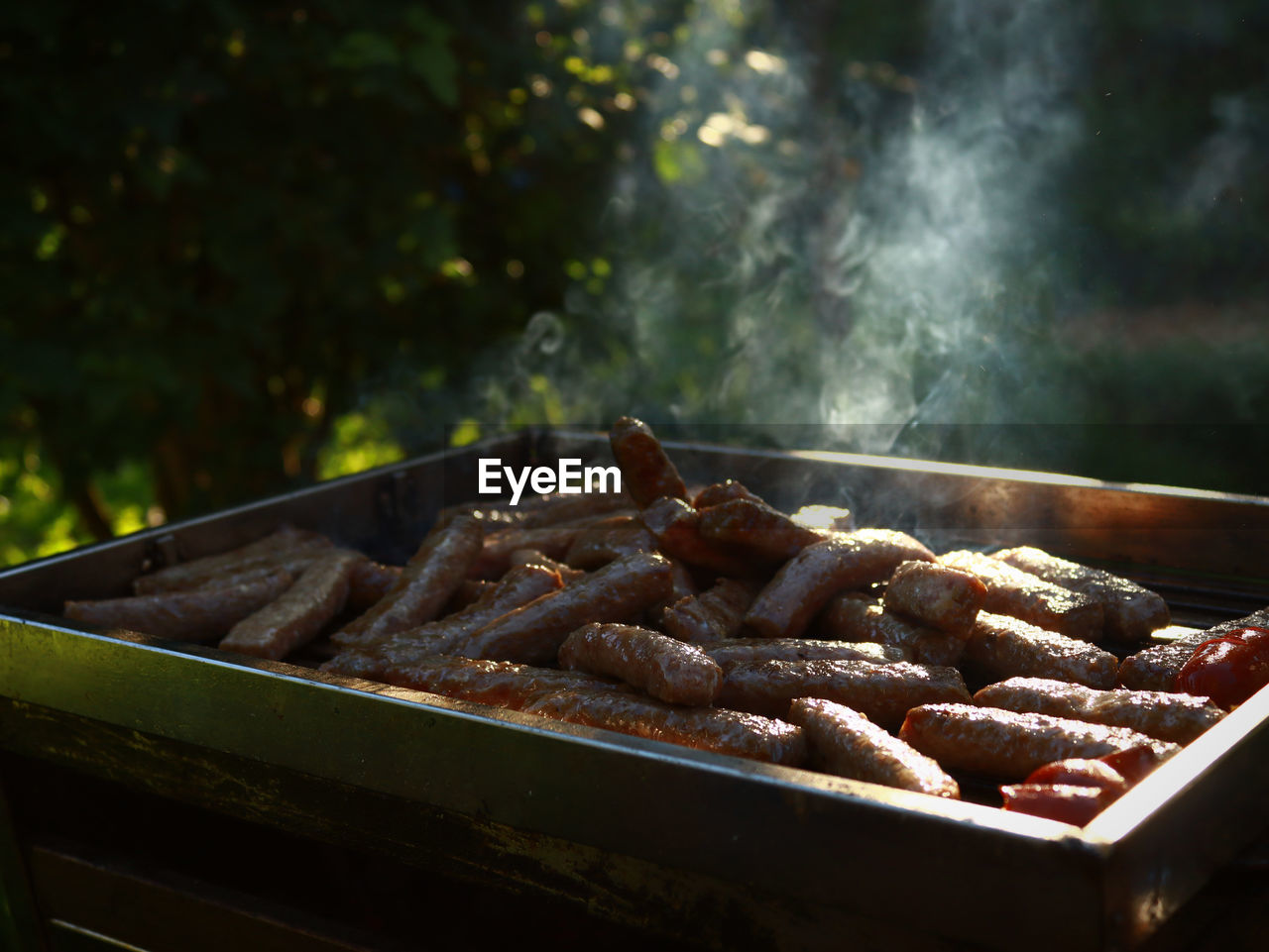 Close-up of meat on barbecue grill