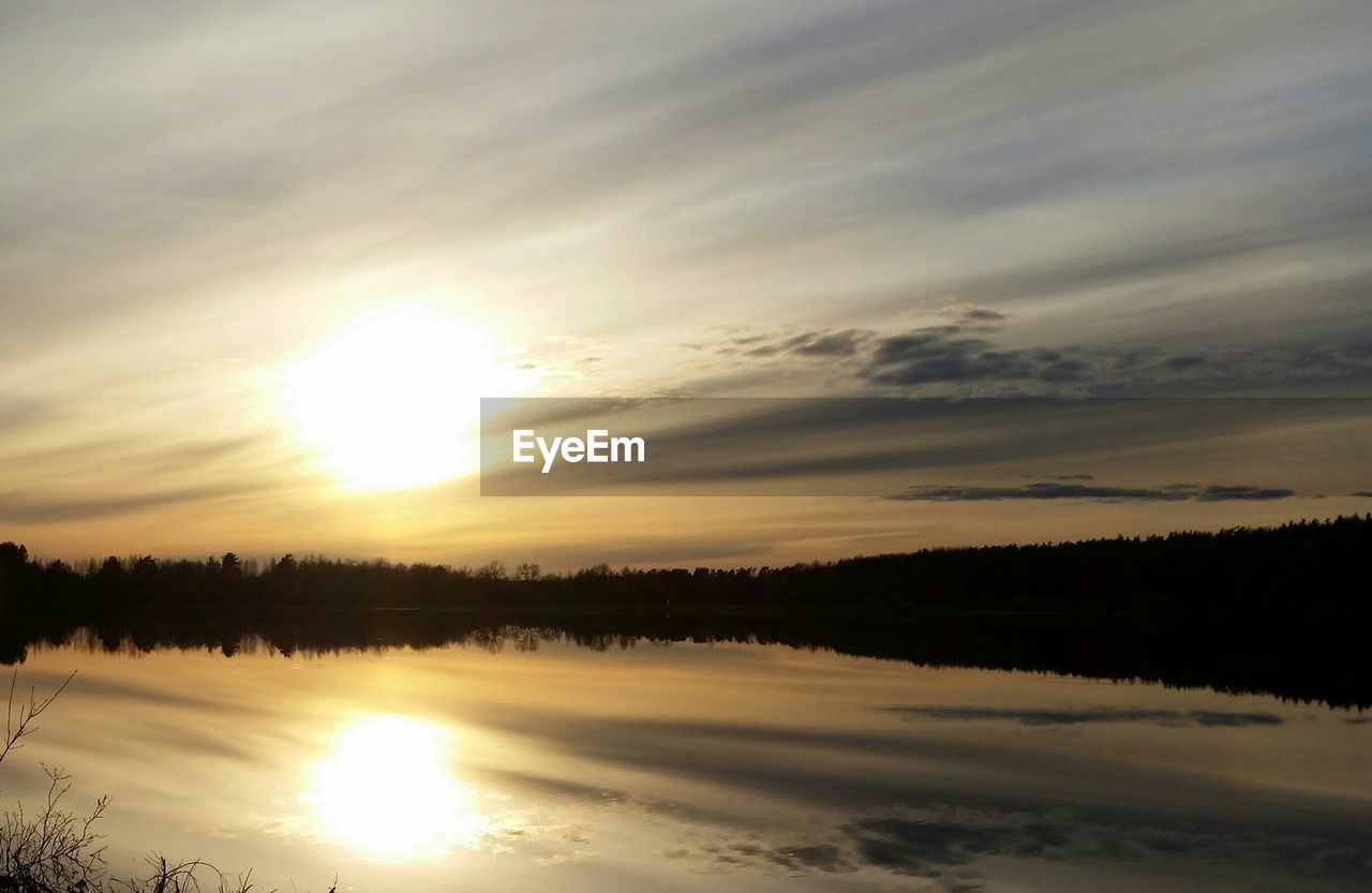 Sunset over the lake merevskoe