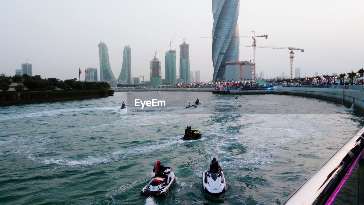 PANORAMIC VIEW OF PEOPLE ON BRIDGE