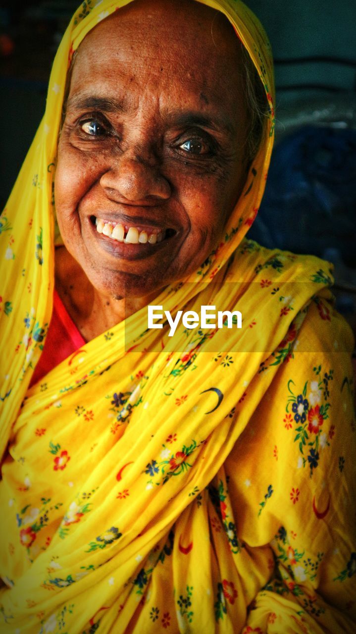 Portrait of smiling senior woman at home 