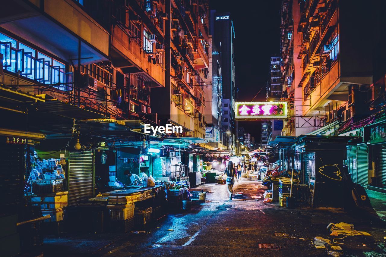 ILLUMINATED STREET MARKET AT NIGHT