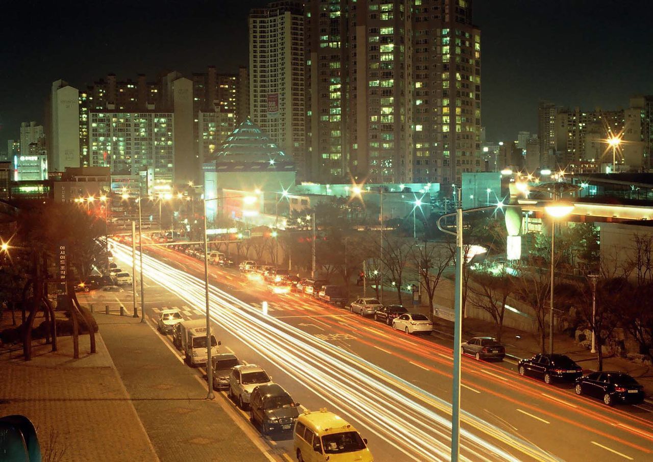 Traffic on city street at night