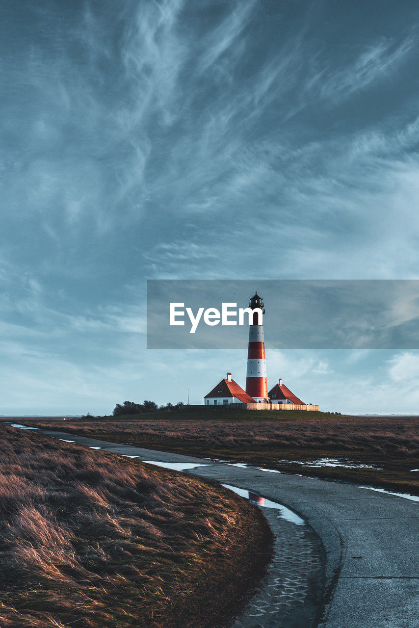 Westerheversand lighthouse on the north sea a landmark of the eiderstedt peninsula in germany.