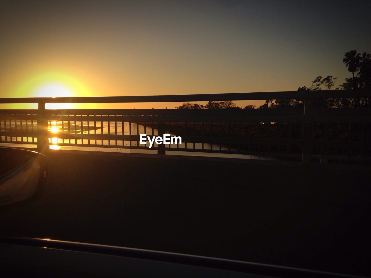 View of river against sunset