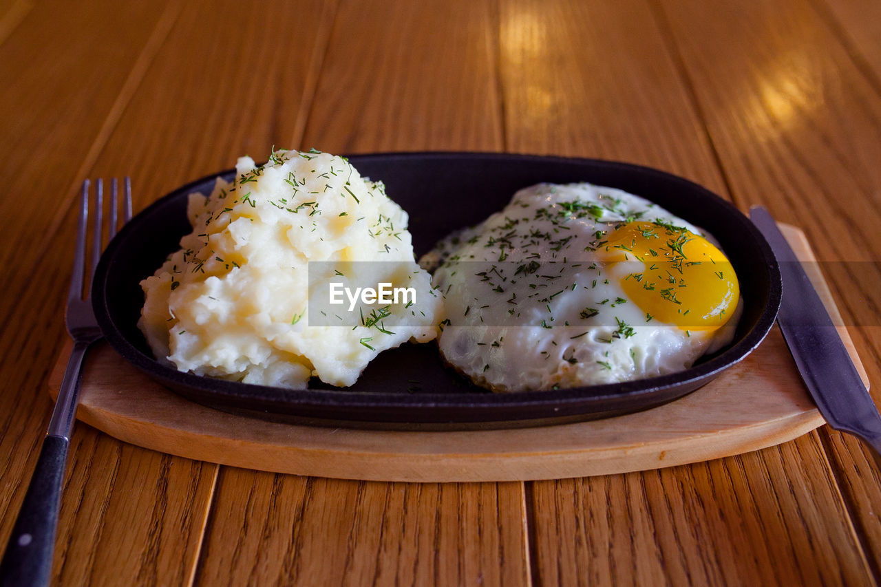 High angle view of breakfast served on table