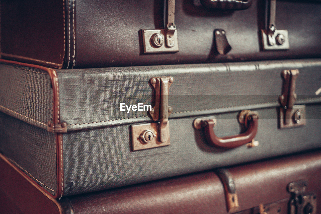 Vintage suitcases. selective focus on suitcases detail, blurred background. close up