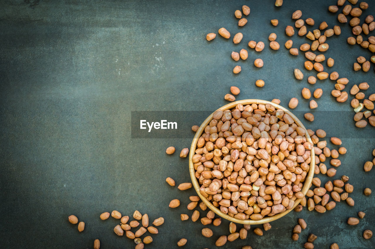 High angle view of peanuts in bowl on table