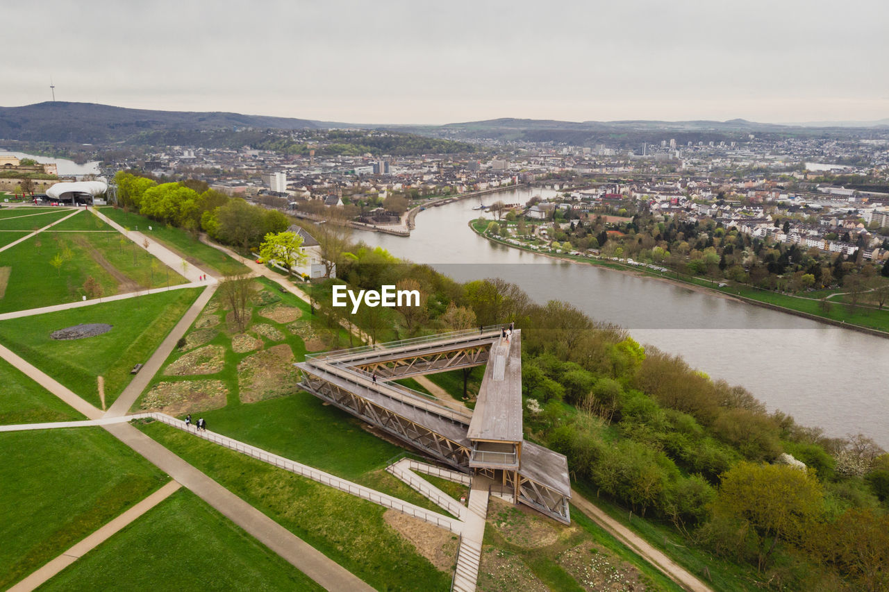 Aerial view of cityscape against sky