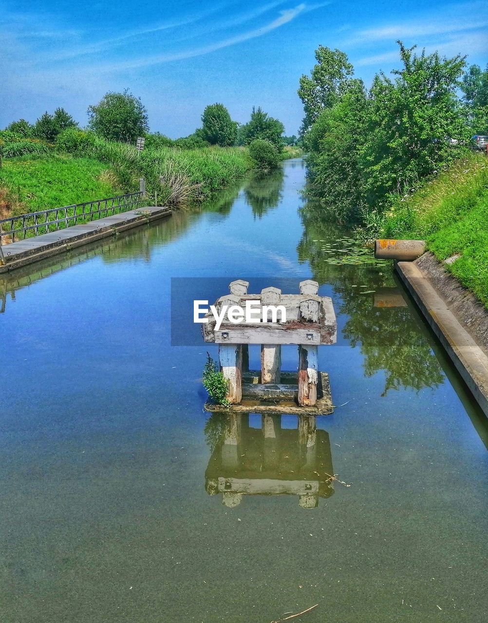 BOAT ON LAKE AGAINST SKY