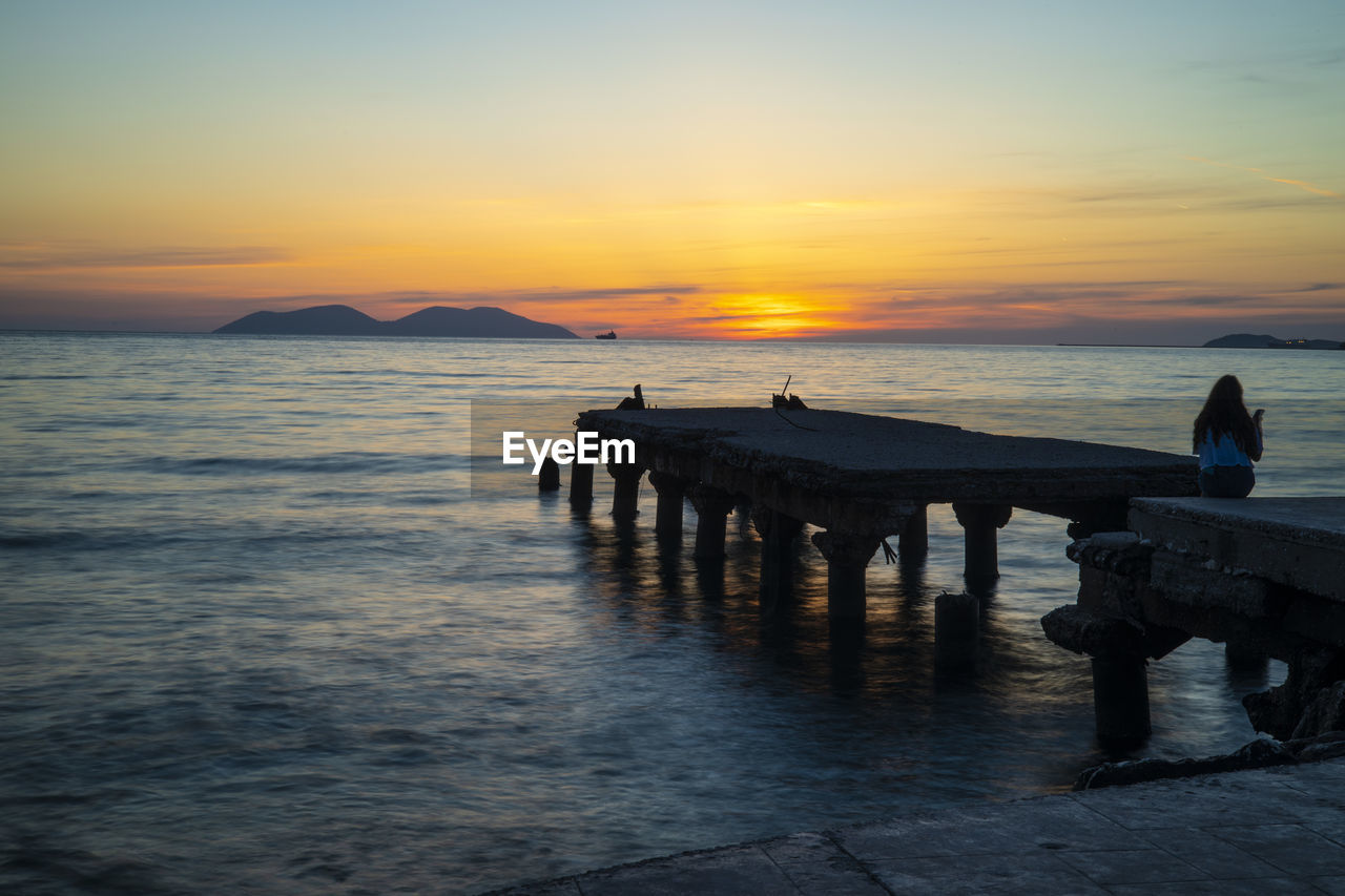 SCENIC VIEW OF SEA DURING SUNSET