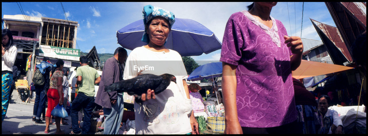 the rituals of the batak people in toba Analogue Photography Architecture ASIA Batak  Ferry Gods INDONESIA Island Market Panoramic Pulau Toba Rituals Shore Slidefilm Sumatra  Summer Toba Tribal Water