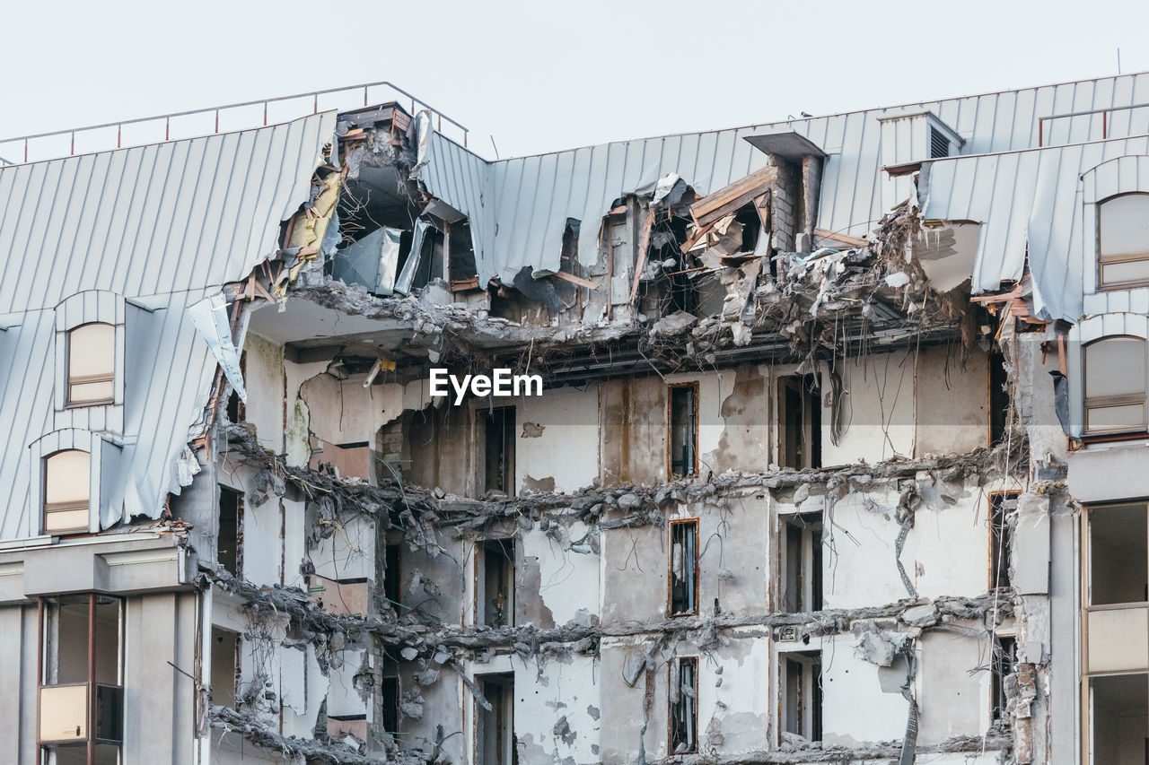 Photo of destroyed building, demolition of a building, house ruins, rebirth, reconstruction