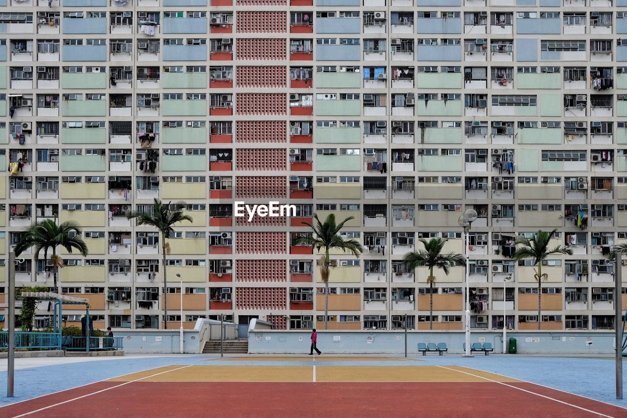 Playing field in front of buildings in city
