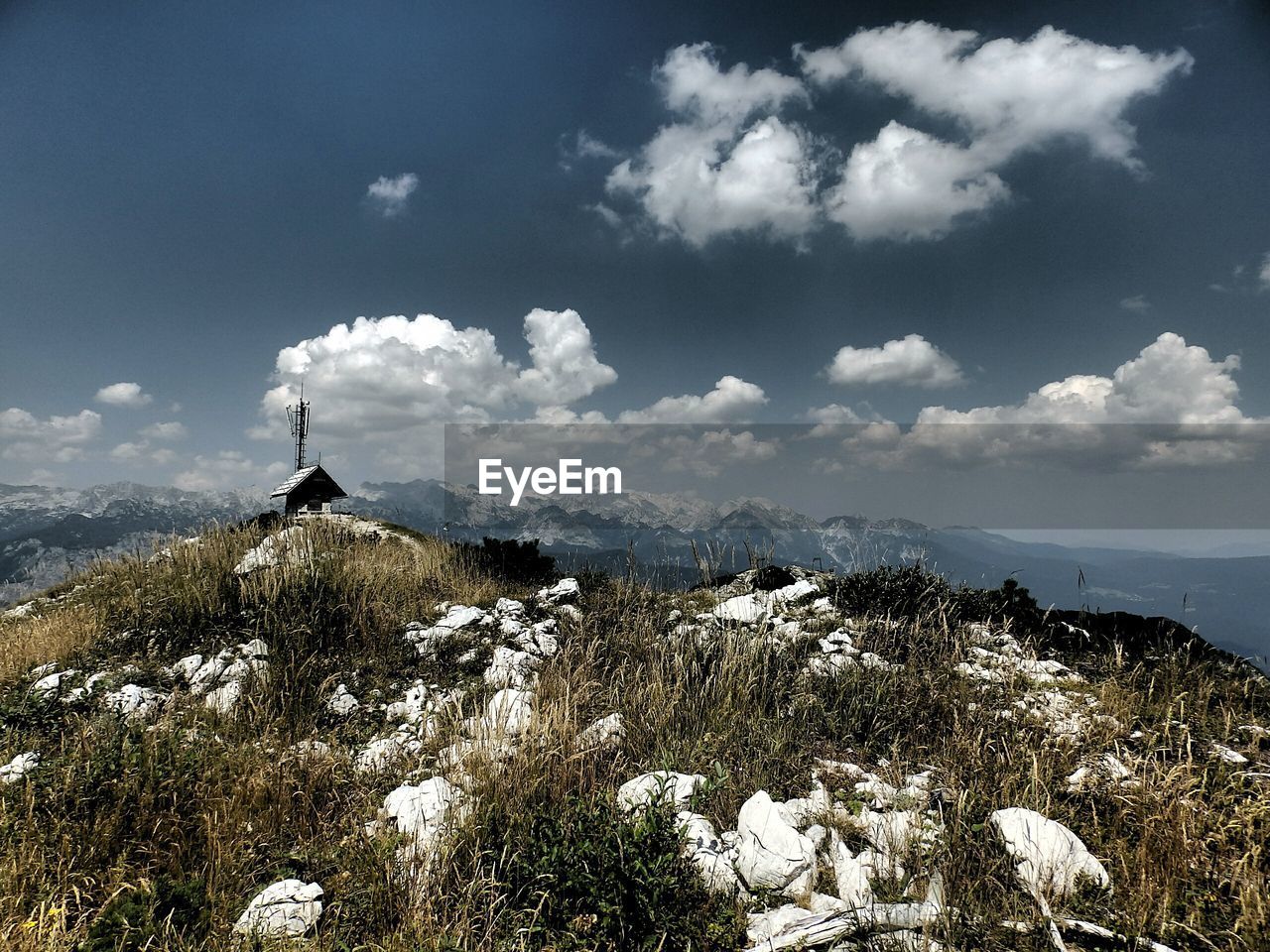 Scenic view of landscape against sky during winter