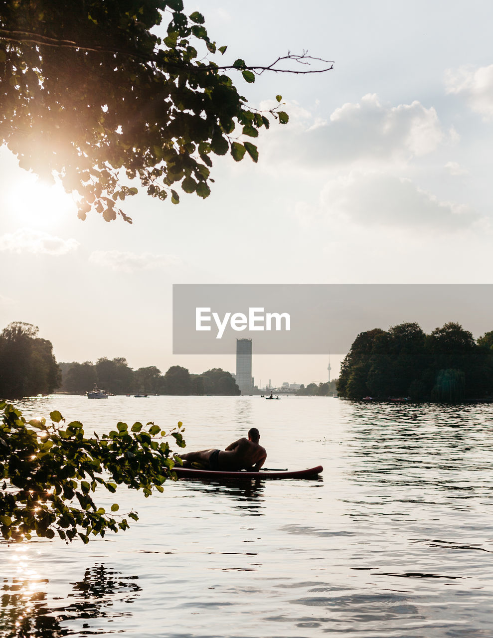 SCENIC VIEW OF LAKE AGAINST TREES