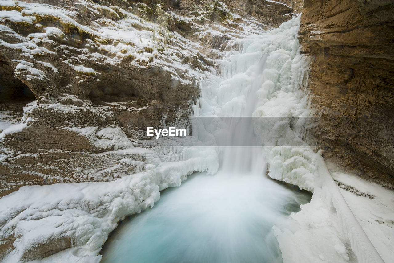 Johnston canyon frozen waterfall in winter