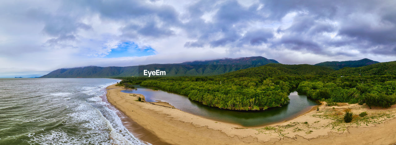 land, water, cloud, sky, environment, scenics - nature, landscape, beach, sea, nature, beauty in nature, body of water, panoramic, coast, mountain, shore, sand, travel, travel destinations, tree, plant, no people, tranquility, tourism, outdoors, coastline, forest, holiday, vacation, ocean, summer, trip, island, non-urban scene, tranquil scene, cloudscape, bay, dramatic sky, day, blue, reservoir, terrain