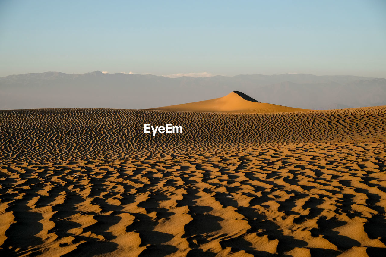 Scenic view of desert against sky