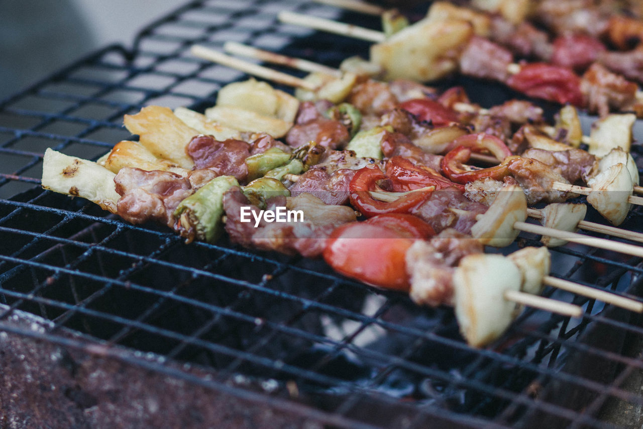 Close-up of meat on barbecue grill