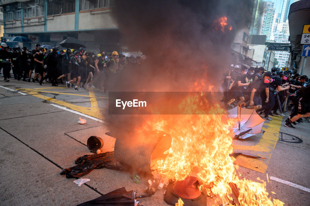 People on city street during riot