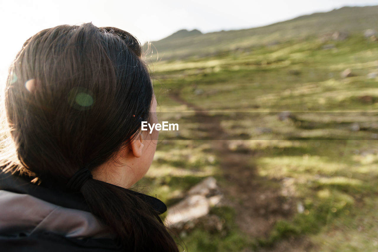 Rear view of woman looking at mountain