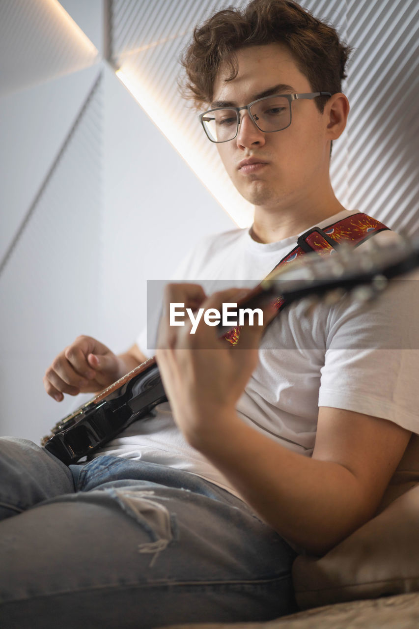 young man playing violin