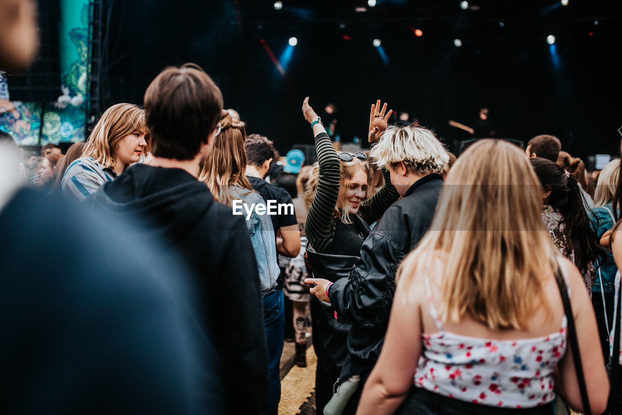 PEOPLE ENJOYING MUSIC CONCERT