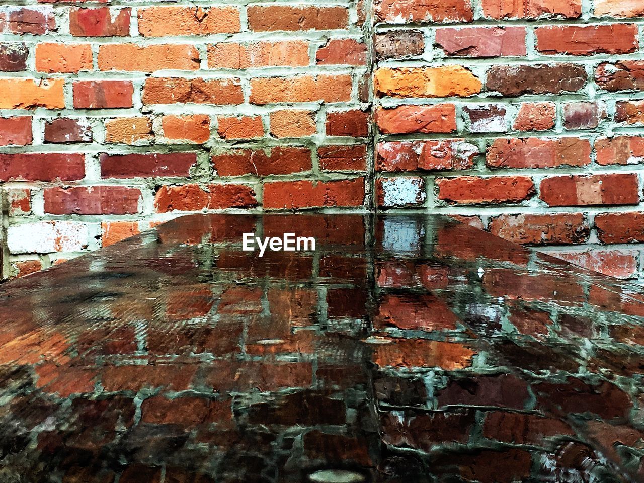 Full frame shot of weathered red brick wall