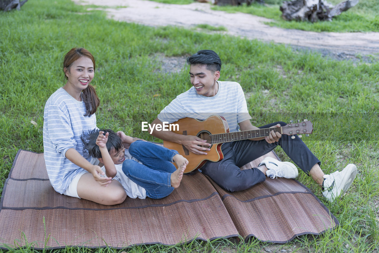 man playing guitar