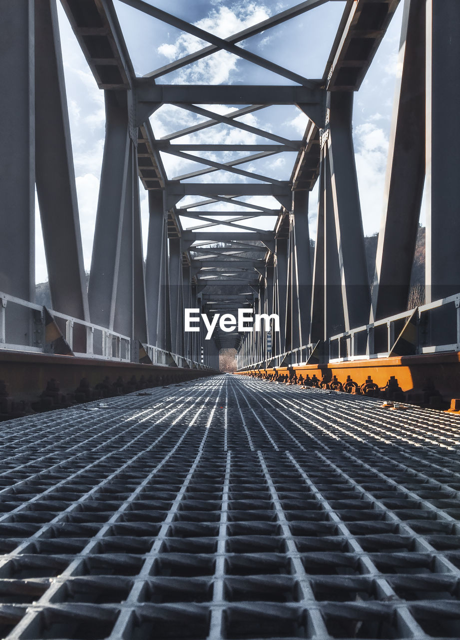 Surface level of railway bridge against sky