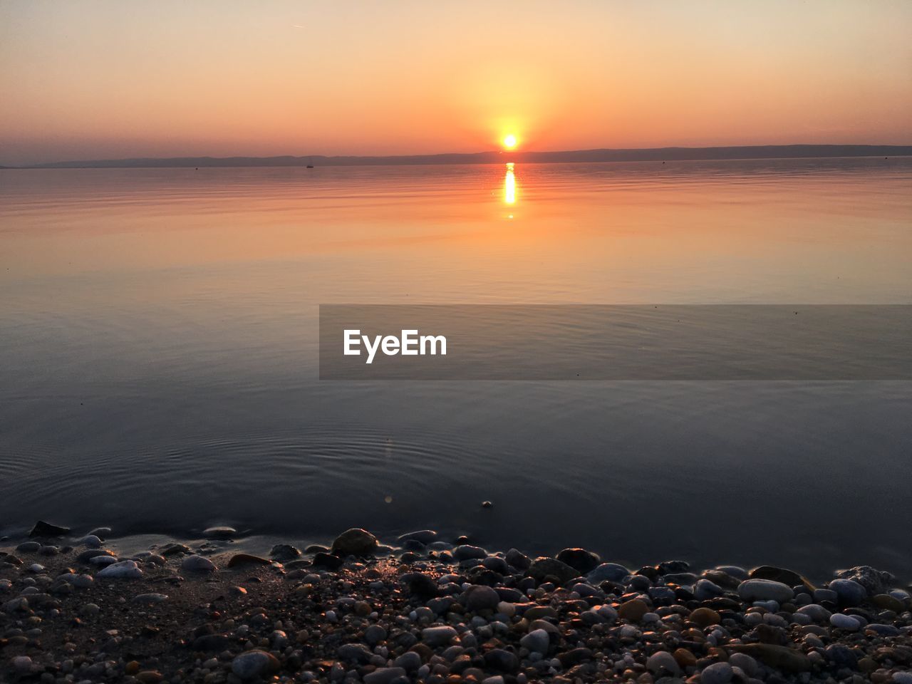 Scenic view of sea during sunset