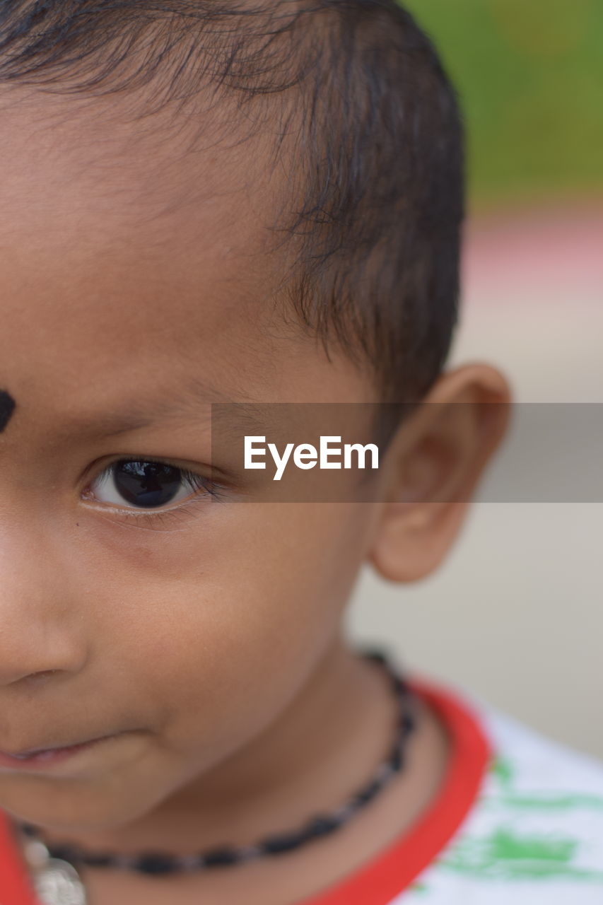 Close-up portrait of innocent boy 