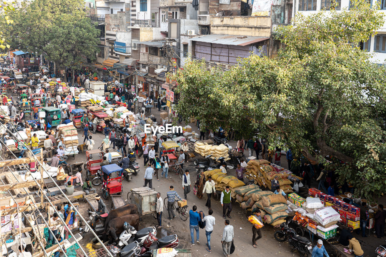 High angle view of people on street market