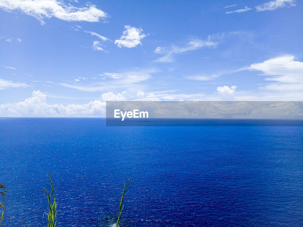 SCENIC VIEW OF SEASCAPE AGAINST SKY