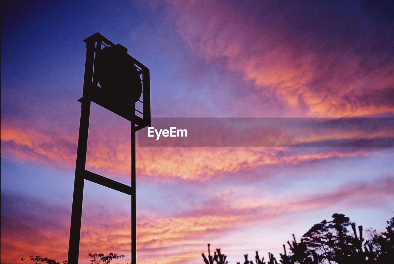 LOW ANGLE VIEW OF SILHOUETTE DRAMATIC SKY