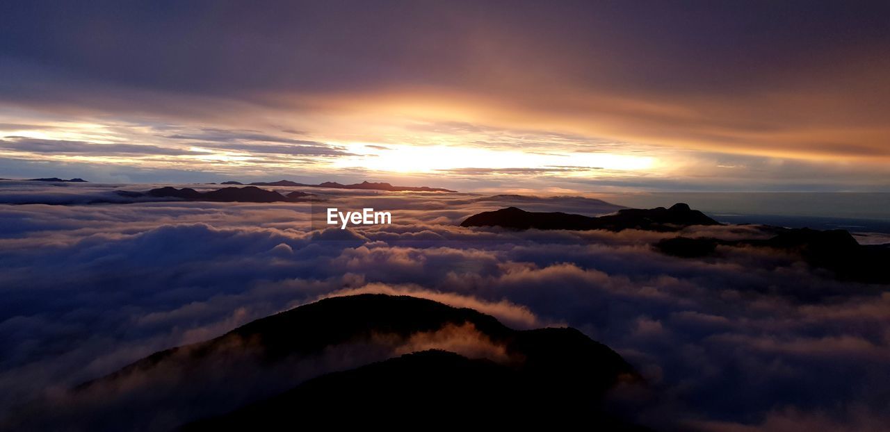 Scenic view of cloudscape against sky during sunset