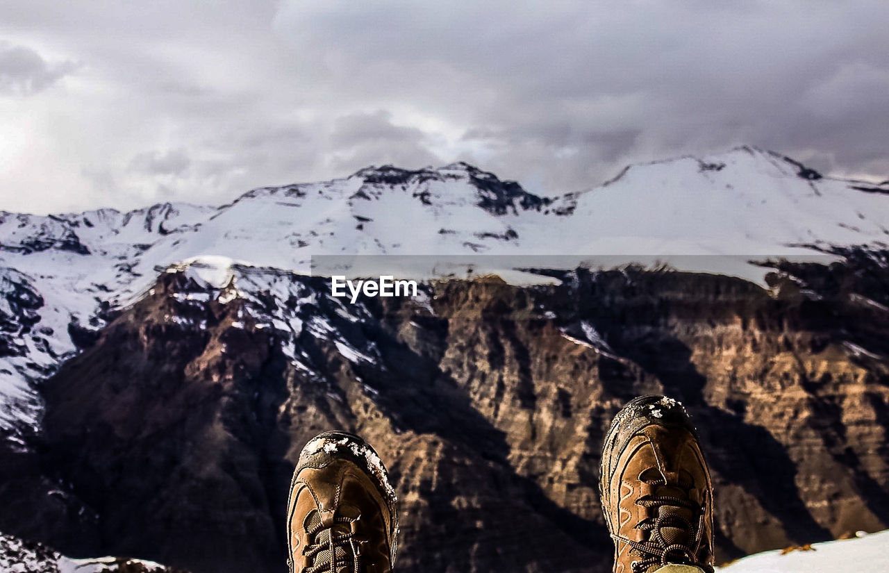 Scenic view of mountains against sky during winter