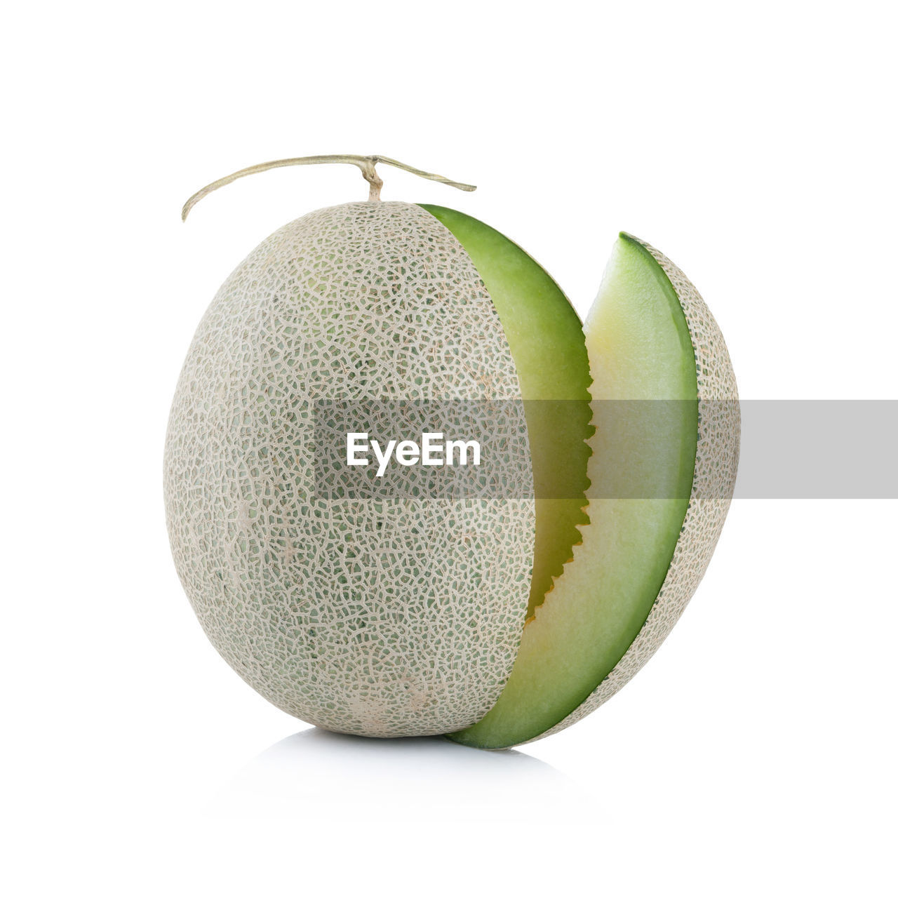 Close-up of melon against white background