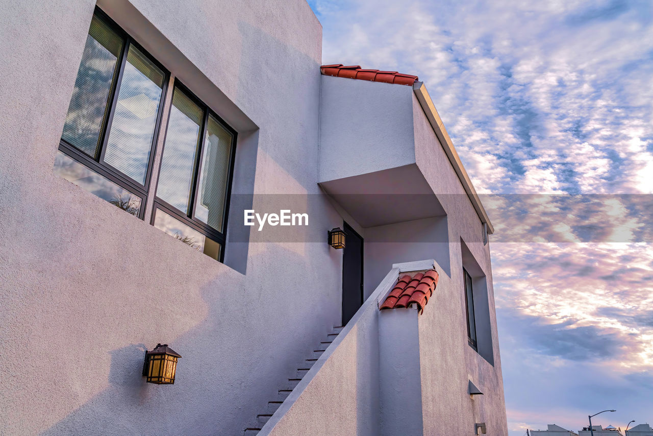 LOW ANGLE VIEW OF RESIDENTIAL BUILDING